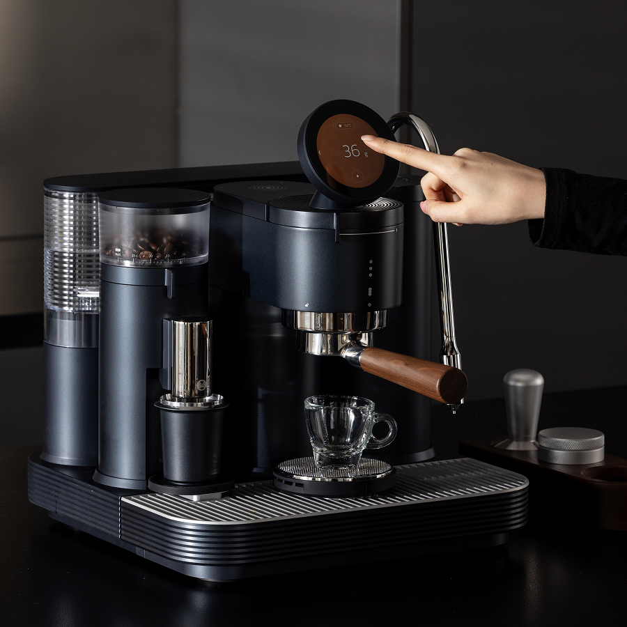 The Meraki espresso machine with built-in grinder ensures fresh beans and perfect espresso in one sleek unit.