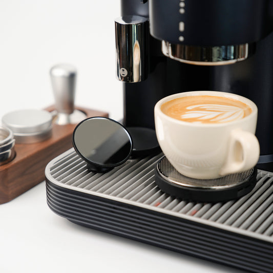 Meraki espresso machine with shot mirror, latte and home barista accessories