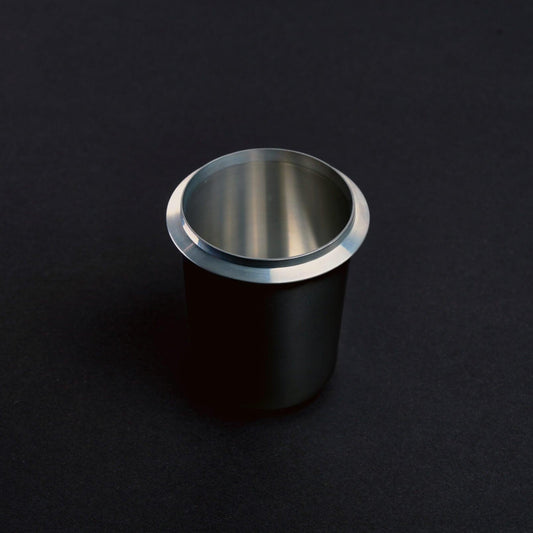 Black Meraki dosing cup for weighing and transferring espresso coffee