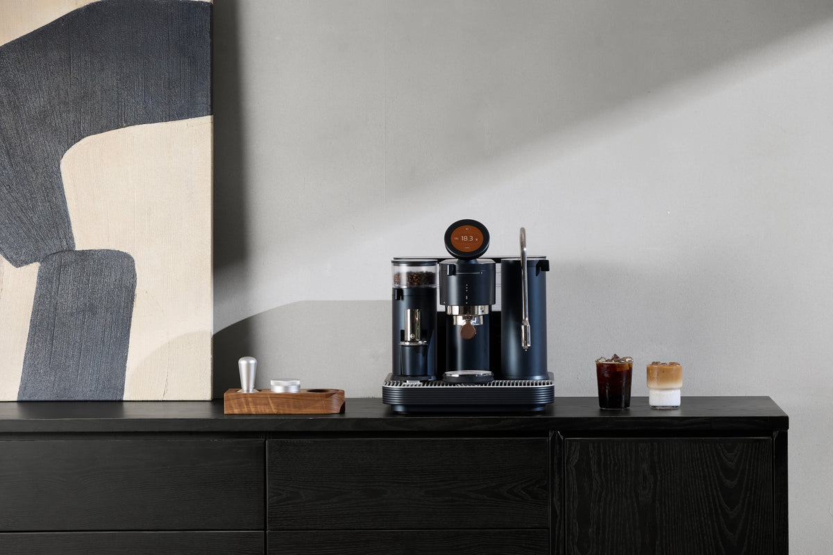 Meraki espresso machine placed on a stable kitchen counter