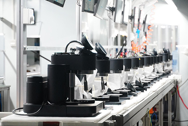 An image showcasing the production line and manufacturing process for the final iteration of the espresso machine, as the engineering team prepares for full-scale production.