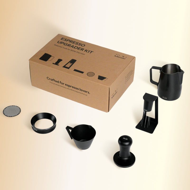 Meraki Espresso Upgrader Kit with tamper, WDT tool, dosing funnel, measuring cup, puck screen, and milk frothing pitcher