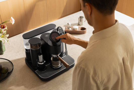 Adjusting the touchscreen on a black Meraki espresso machine