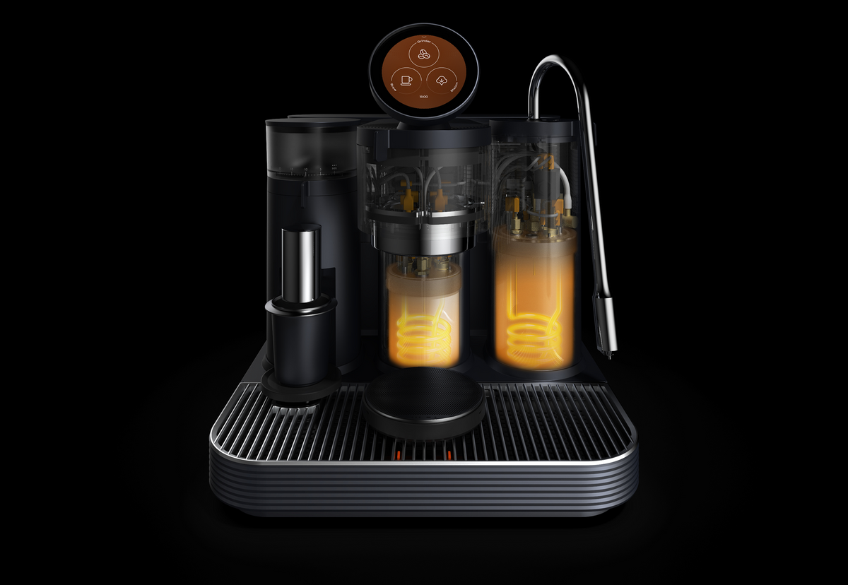 Cutaway illustration of the dual-boiler system inside a Meraki espresso machine