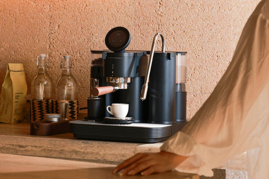 Best dual boiler espresso machine with grinder and automatic milk frother, designed as a professional coffee machine for home.