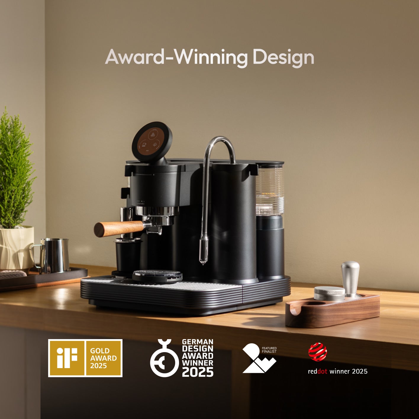 Black Meraki espresso machine, winner of the iF Gold Award 2025, German Design Award 2025 and Red Dot Award 2025