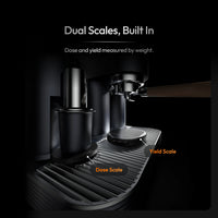 Built-in dose scale under the grinder and yield scale on the drip tray of the Meraki espresso machine