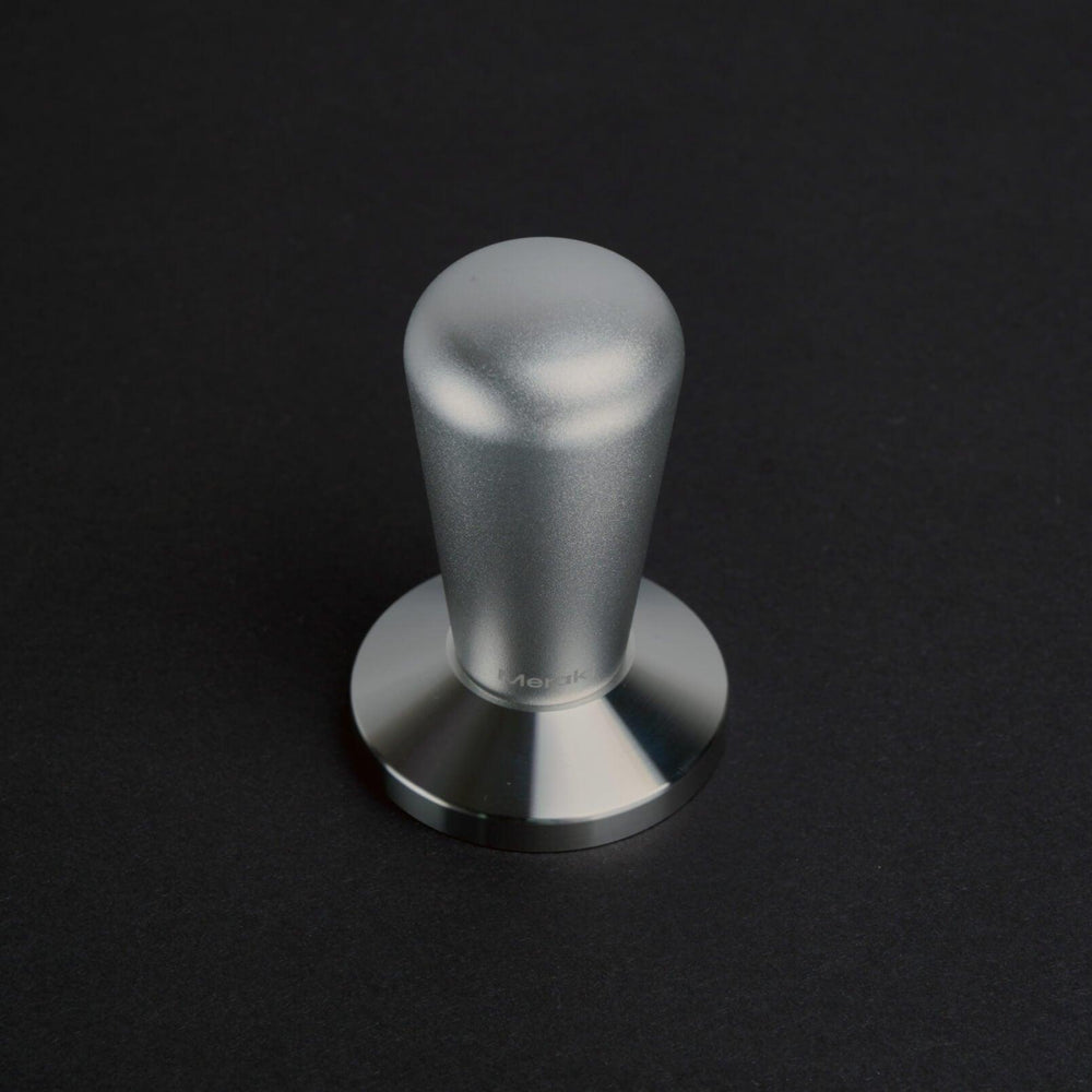 Flat-base Meraki espresso tamper in brushed metal