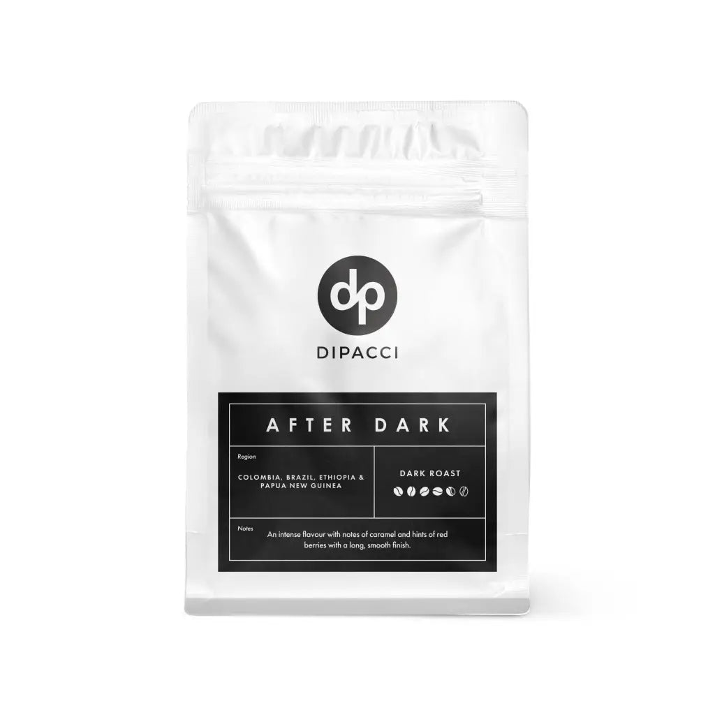 Dipacci After Dark dark roast coffee beans in a white stand-up pouch.