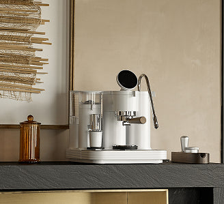 Compact high end home espresso machine fits perfectly in small kitchen spaces without sacrificing performance.